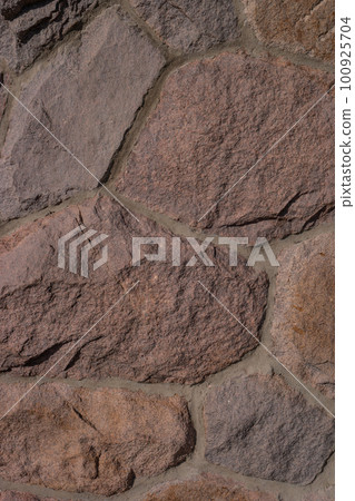Pattern of ancient bricks and stones at old middle age wall, as a background, closeup, details. Pattern of ancient bricks and stones at old middle age wall, as a background, closeup, details. 100925704