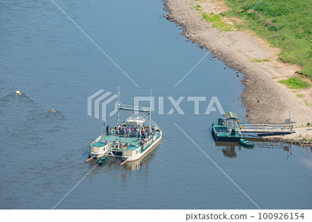 Ferry service with modern catamaran at Bastei sandstone pillars near Kurort Rathen village in the national park Saxon Switzerland by Dresden and Elbe river, Saxony, Germany. 100926154