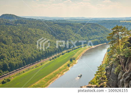 Panoramic birdview over monumental Bastei sandstone pillars near Kurort Rathen village in the national park Saxon Switzerland by Dresden and Elbe river, Saxony, Germany. Panoramic birdview over monumental Bastei sandstone pillars near Kurort Rathen village in the national park Saxon Switzerland by Dresden and Elbe river, Saxony, Germany. 100926155