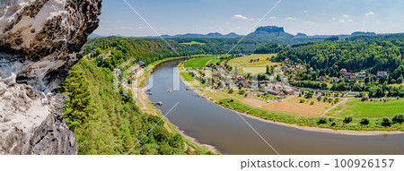 Panoramic birdview over monumental Bastei sandstone pillars near Kurort Rathen village in the national park Saxon Switzerland by Dresden and Elbe river, Saxony, Germany. 100926157