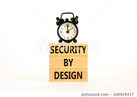 Security by design symbol. Concept words Security by design on wooden blocks on a beautiful white table white background. Black alarm clock. Business finacial security by design concept. Copy space. Security by design symbol. Concept words Security by design on wooden blocks on a beautiful white table white background. Black alarm clock. Business finacial security by design concept. Copy space. 100926437