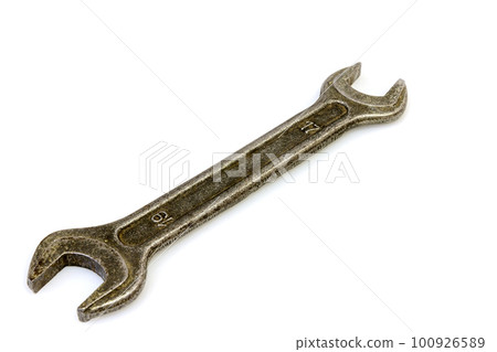 Horn metal old spanner on a white background Horn metal old spanner on a white background 100926589