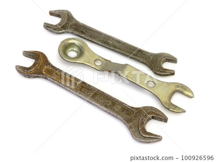 Horn metal old spanner on a white background Horn metal old spanner on a white background 100926596