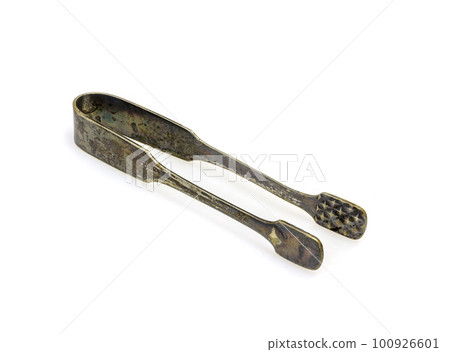 Kitchen tongs for sugar or ice on a white background Kitchen tongs for sugar or ice on a white background 100926601