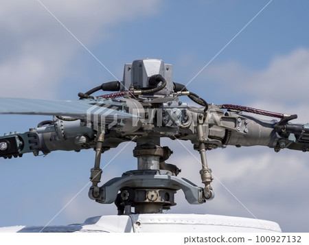 The mechanism of co-axial screws military helicopter on the background of blue sky, a close-up The mechanism of co-axial screws military helicopter on the background of blue sky, a close-up 100927132