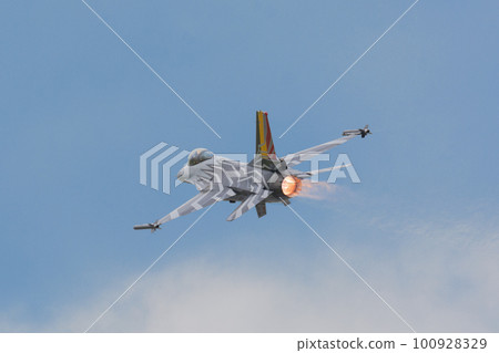 Belgian Air Force F-16 display team above the clouds 100928329