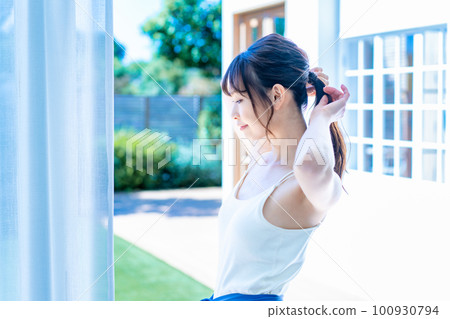 Young woman in yoga wear Young woman in yoga wear 100930794