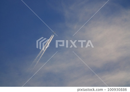 Jet aircraft and contrails illuminated by the morning sun Spring Sky only 230301am Jet aircraft and contrails illuminated by the morning sun Spring Sky only 230301am 100930886