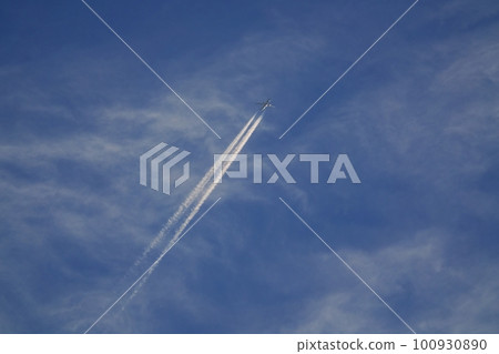 Jet aircraft and contrails illuminated by the morning sun Spring Sky only 230301am Jet aircraft and contrails illuminated by the morning sun Spring Sky only 230301am 100930890