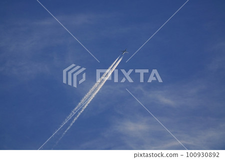 Jet aircraft and contrails illuminated by the morning sun Spring Sky only 230301am Jet aircraft and contrails illuminated by the morning sun Spring Sky only 230301am 100930892
