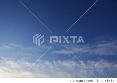 Refreshing blue sky and cirrus clouds illuminated by the morning sun, spring, telephoto, sky only, 230301am Refreshing blue sky and cirrus clouds illuminated by the morning sun, spring, telephoto, sky only, 230301am 100931618