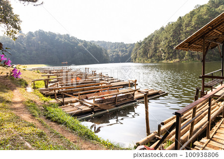 Pang Ung is a tourist attraction in Mae Hong Son, Northern Thailand with scenic alpine lake and pine trees. Rides on bamboo rafts is available. 100938806