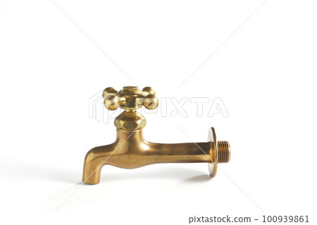 白色背景拍攝的懷舊老式黃銅水龍頭 100939861