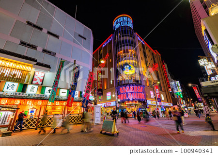 Tokyo, Taito Ward, Asakusa, Broadway shopping street in Rokku at night 100940341