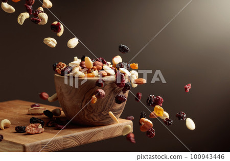 Flying dried fruits and nuts. Flying dried fruits and nuts. 100943446