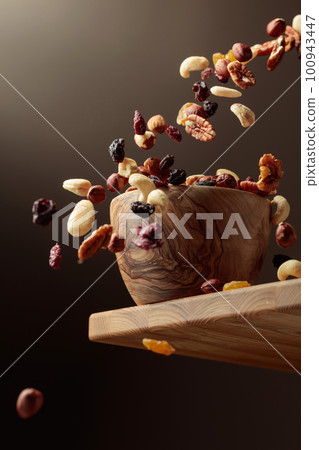 Flying dried fruits and nuts. Flying dried fruits and nuts. 100943447