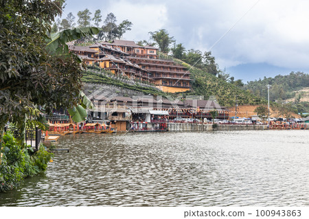 Ban Rak Thai, a beautiful village within Mae Hong Son province, Thailand, with scenic lake and stunning landscape. Popular tourist destination. 100943863
