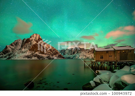 Beautiful nature lanscape of Lofoten  with northern lights 100943972