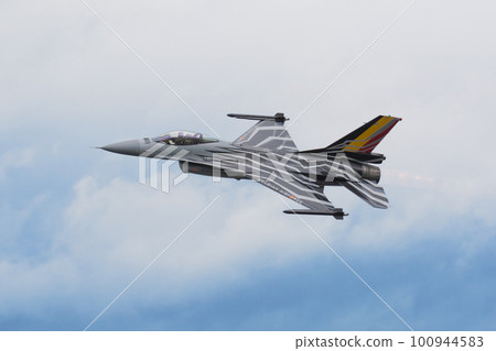 Belgian Air Force F-16MLU display team above the clouds 100944583