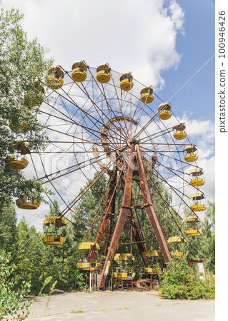 Abandoned rusty Ferris wheel in Pripyat Ukraine 100946426