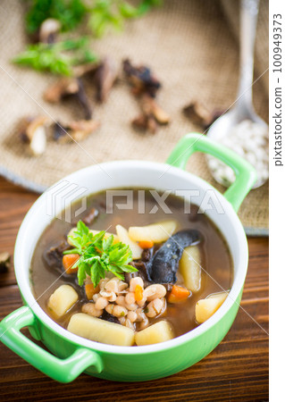 mushroom hot soup with beans in a bowl mushroom hot soup with beans in a bowl 100949373