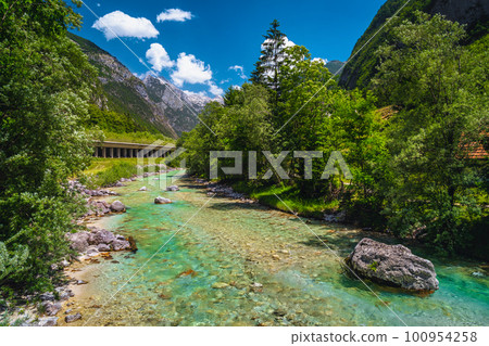 Clean, turquoise Soca river in the forest, Kobarid, Slovenia Clean, turquoise Soca river in the forest, Kobarid, Slovenia 100954258