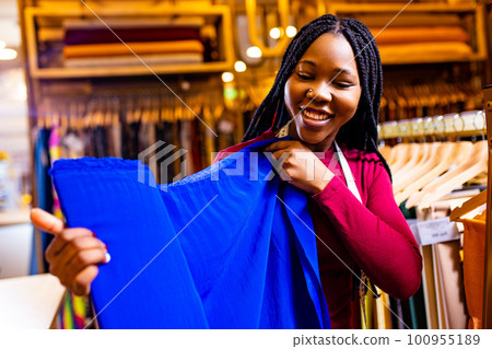 authentic ethnic africa america sellerwoman working in shop authentic ethnic africa america sellerwoman working in shop 100955189