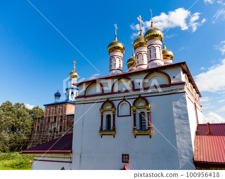 View of the ancient Church of the Resurrection of the 17th century in the village of Trubino, Kaluzhskiy region, Russia 100956418