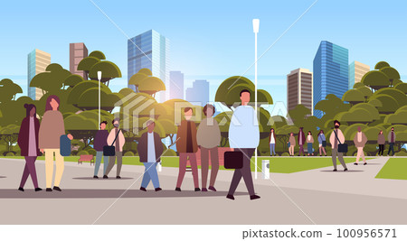 multiethnic people group walking outdoor mix race men women crowd spending time in urban park multiethnic people group walking outdoor mix race men women crowd spending time in urban park 100956571