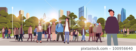 multiethnic people group walking outdoor mix race men women crowd spending time in urban park cityscape background 100956640