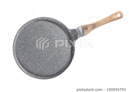 Empty pan for frying pancakes isolated on a white background. Top view Empty pan for frying pancakes isolated on a white background. Top view 100956745