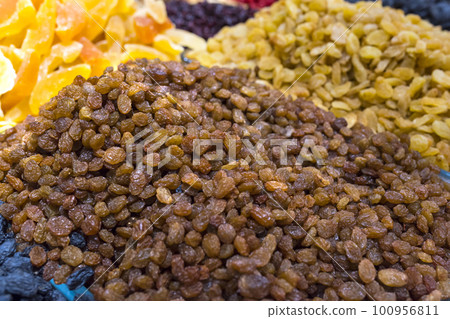Natural background made from different kinds of raisins Natural background made from different kinds of raisins 100956811