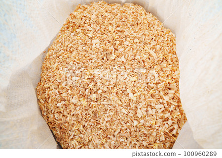 sawdust and shavings in bag. material for agriculture. mulch sawdust and shavings in bag. material for agriculture. mulch 100960289