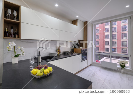 Black and white modern luxury kitchen interior Black and white modern luxury kitchen interior 100960963