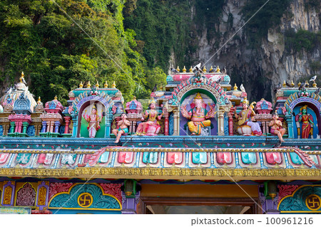 Colorful of Hindu temple in Batu Caves in Gombak, Selangor, Malaysia. Colorful of Hindu temple in Batu Caves in Gombak, Selangor, Malaysia. 100961216