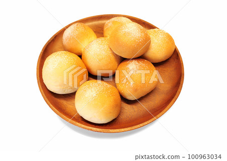 White back photo of homemade round bread baked in home bakery 100963034