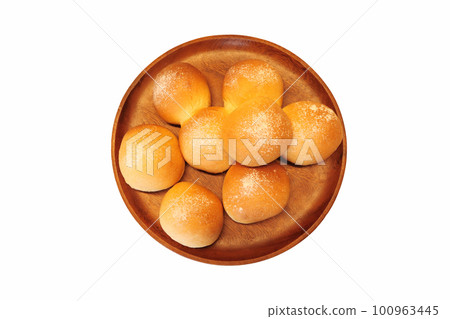 A white background photograph of homemade round bread baked in a home bakery taken from directly above 100963445