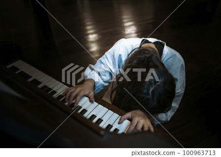 School ghost playing the piano in the music room Psychic phenomenon 100963713