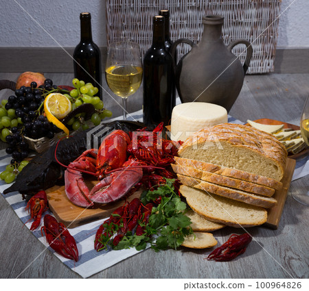 Still life with cooking marine products, wine and cheese 100964826