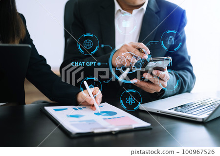 Man and woman using chatbot in computer and tablet  smart intelligence Ai.Chat GPT Chat with AI Artificial Intelligence, developed by OpenAI generate. Futuristic technology, robot in online system. 100967526