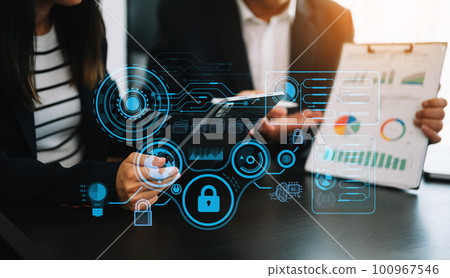 Cyber security and data protection information privacy internet technology concept.Business working on computer show padlock protecting business and financial data technology concept.. 100967546