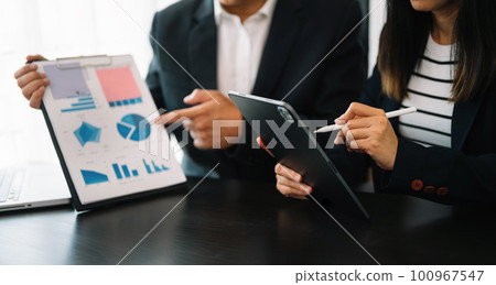 Business team meeting present.professional investor working with Finance managers task. with digital tablet,smartphone and laptop at office 100967547