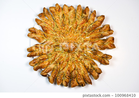 Sun recipe in puff pastry with smoked salmon and boursin cheese Sun recipe in puff pastry with smoked salmon and boursin cheese 100968410