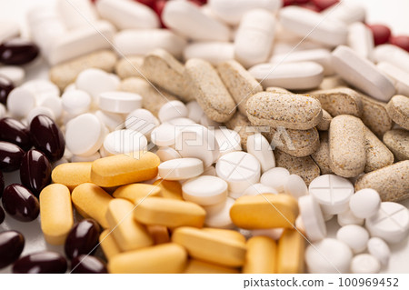 Various medicine tablets 100969452