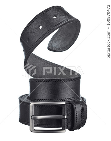 Beautiful black leather belt with a metal buckle, beautifully twisted in a spiral, isolated on a white background. 100970472