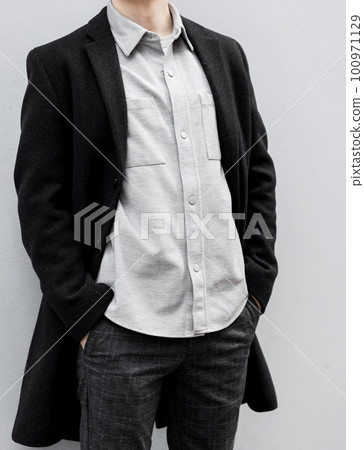 young stylish man in autumn coat 100971129