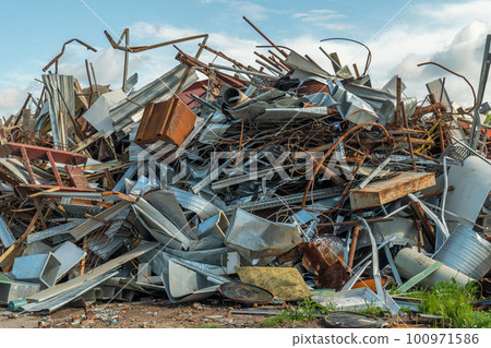 Processing industry, a pile of old scrap metal, ready for recycling. Scrap metal recycling. 100971586