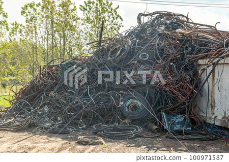 Processing industry, a pile of old scrap metal, ready for recycling. Scrap metal recycling. 100971587