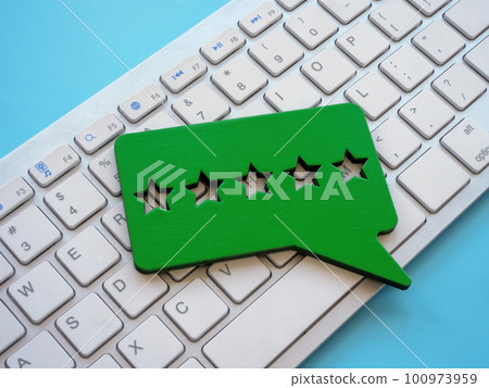 Keyboard and plate with five stars for review. 100973959