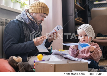 Man wearing warm clothing feeling cold . Energy crisis in Europe 100975046